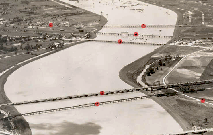Bridges spanning the Trinity River in 1935. The Streetcar Viaduct is labeled with the number eight, near the bottom of the photo. Courtesy of Southern Methodist University Libraries.