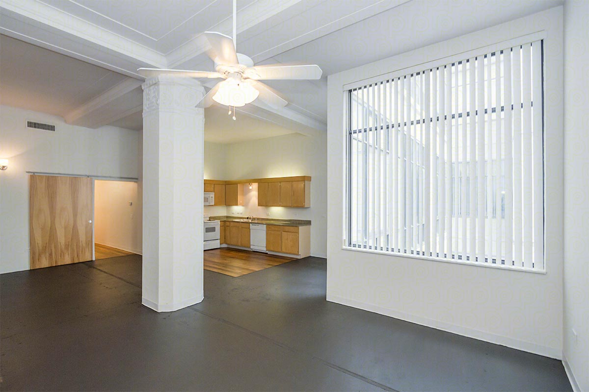 One of the converted loft apartments at 1900 Elm. The ornamentation visible at the top of the column is preserved from the space's department store days. Photo courtesy of 1900 Elm.