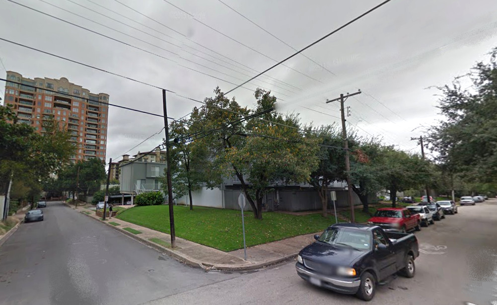 The Point Two Turtle Creek Condos, an aging gray complex, would be demolished to make way for a Toll Brothers tower.